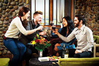 Couples Toasting in 2Hawk Vineyard and Winery Tasting Room