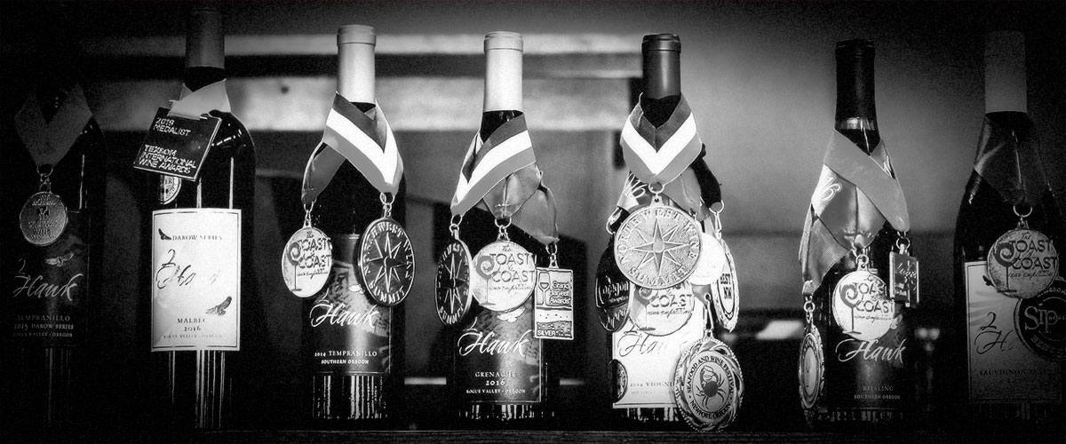 2Hawk Bottle Lineup with Awards (Grayscale)